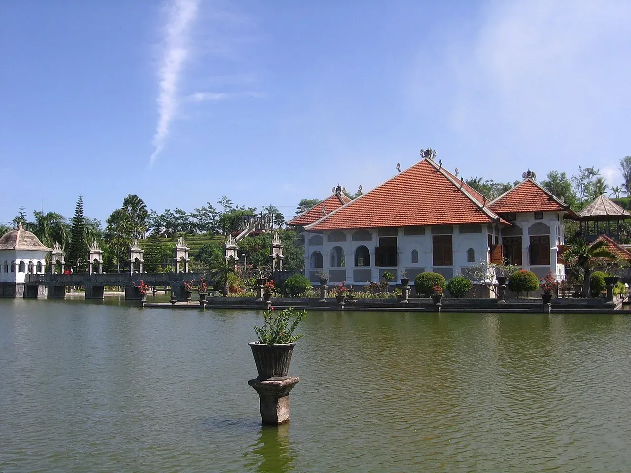 A pavilion and bridge above a pond at Taman Ujung