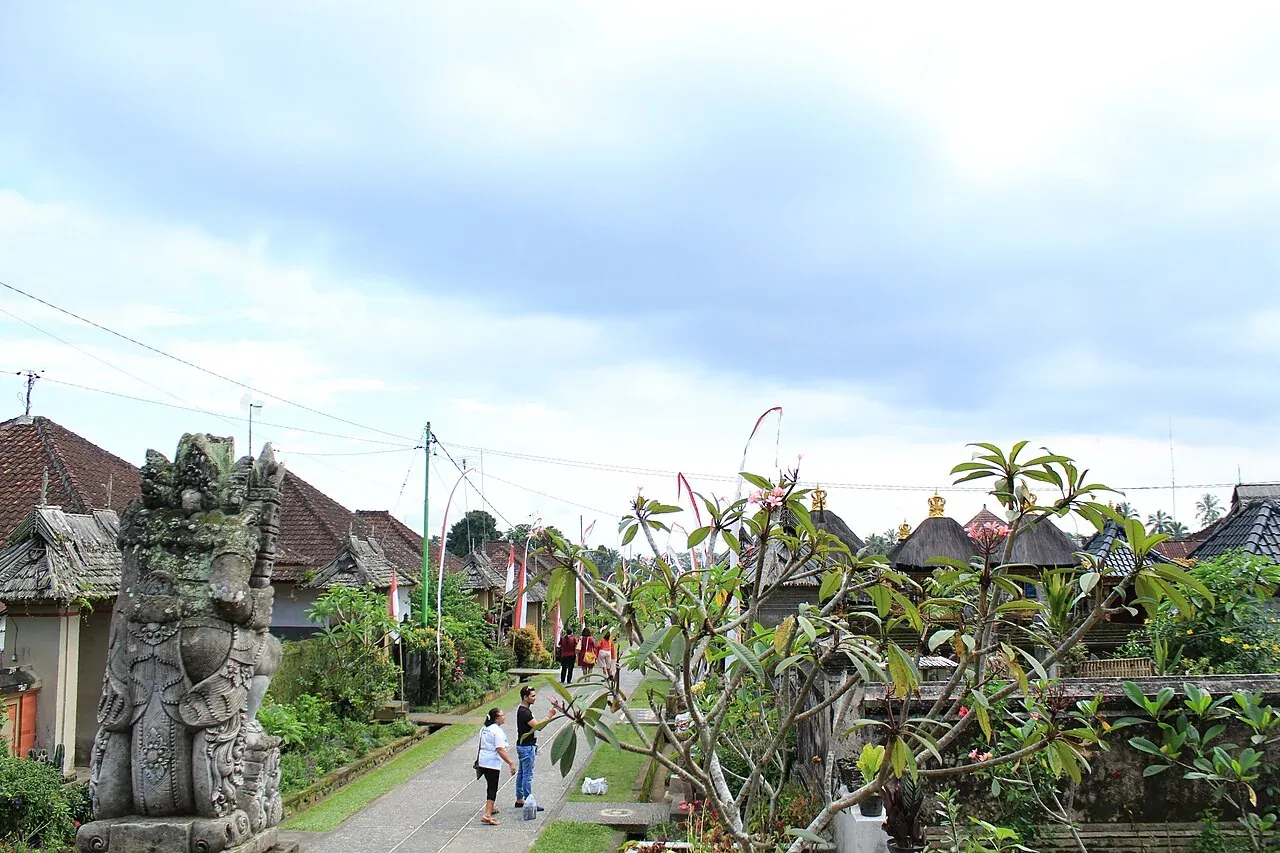 The village path beside traditional gates and houses in Penglipuran