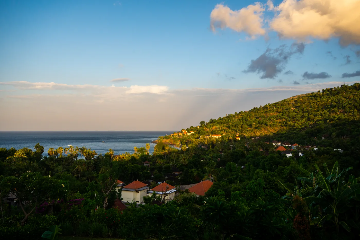 The green coast of Amed in warm sunrise light — The coast near Amed